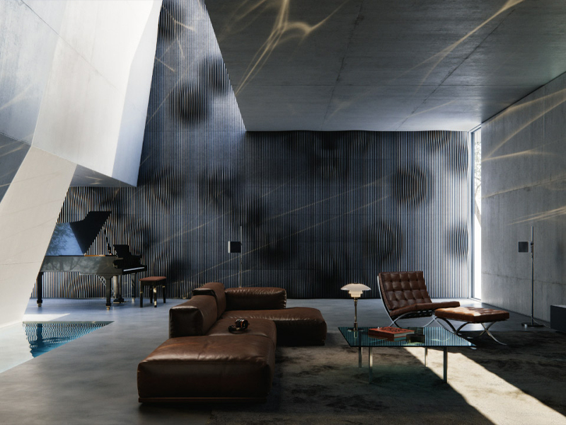 Luxurious modern living room with brown leather sectional, chaise lounge, glass coffee table, and a striped blue wall.