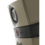 Close-up of a beige high-end speaker with a large silver woofer and a red grille vent, showing the FOCAL brand.