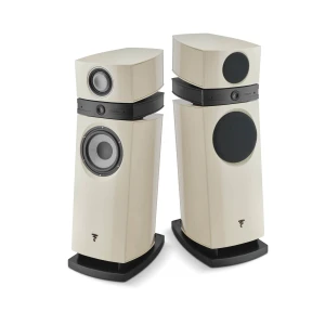 Pair of cream-colored floorstanding loudspeakers with large circular woofers and smaller drivers, mounted on black stands against a white background