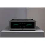 Silver T+A A 3100 HV amplifier with dual glowing VU meters on a black front panel, placed on a white pedestal.
