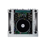 Open electronic enclosure showing the interior of a large hard disk drive with a circular platter and circuit boards visible behind capacitors and wiring