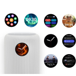 White cylindrical smart speaker with a circular display showing a fiery clock wallpaper and app icons around it