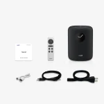 Wiim sound system: black speaker with clock face, remote, user guide labeled 'Sound', and assorted cables (USB, audio, power).
