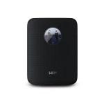Black compact wireless speaker with a perforated mesh grille, circular badge displaying album art on the front, and a subtle brand label near the bottom.