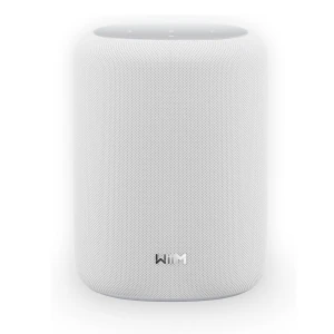 White cylindrical smart speaker with a perforated fabric covering and a smooth top with indicator lights on display edge-to-edge top.