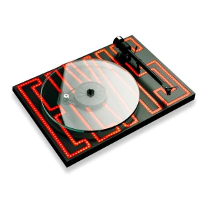DJ turntable with a glass/plastic platter and red LED maze pattern on the black deck, ready for scratching or playing records.