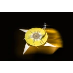 Bright yellow circular sculpture resembling a vinyl disc with a black center label, set on a white star-shaped base against a black background.