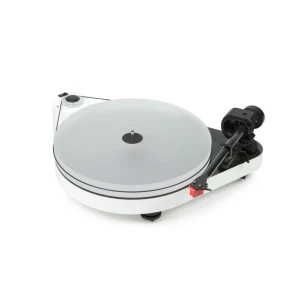 White modern turntable with grey platter and black tonearm ready to play on a white surface