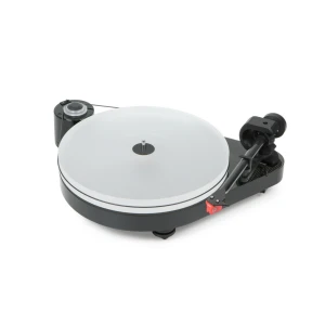 Turntable with a silver platter, black base, and tonearm on the right side.