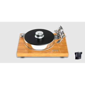 Wooden-turntable with a black platter and chrome tonearm; a silver spindle at center and a separate Ortofon cartridge accessory to the right on a light gray background.