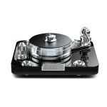 High-gloss black turntable with a silver platter and central spindle, viewed from above