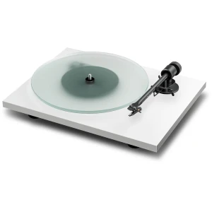 White minimalist turntable with a frosted glass platter and black tonearm on a white base.