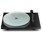Black turntable with a frosted glass-like platter and silver spindle, tonearm resting on the right