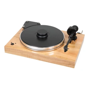 Wooden turntable with a large black platter and metal rim on a light wood base.