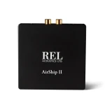 REL Acoustics AirShip II wireless audio module on a black rectangular box with two gold knobs on top