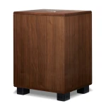 Wooden subwoofer on black pedestal feet, brand REL, photographed from front-left.