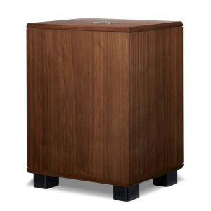 Wooden subwoofer on black pedestal feet, brand REL, photographed from front-left.