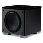 Black subwoofer with front-facing large round driver on silver REL feet.