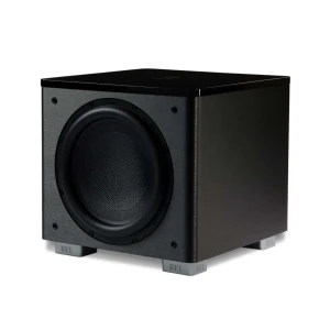 Front view of a black subwoofer with a large circular speaker cone and silver feet labeled REL, placed on a white surface