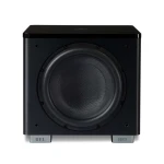 Black compact subwoofer with a large circular front driver and gray feet labeled REL.