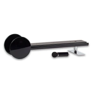 Long black metal bar with two large circular end weights and a chrome stand, with a small black tool nearby.