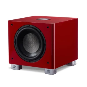 Red cube-shaped subwoofer with a large circular driver on the front, resting on silver feet with crown logos at the corners.