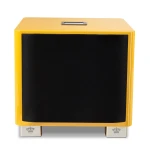 Yellow cabinet-style speaker with a black front grille and crown-marked feet visible at the bottom