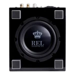 Close-up of a black REL Acoustics subwoofer with a large circular driver and metallic feet on a boxy chassis.