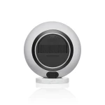 White spherical speaker with a textured white exterior, black circular front panel, and a small marble pedestal underneath.