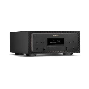 Marantz high-end stereo receiver with a dark brushed-metal front panel, display screen, and multiple control knobs on a textured faceplate on a black chassis.