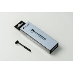 Small black cleaning wand placed beside a light-blue CLEAN-IT box (Pro-Ject Audio Systems) on a white surface.