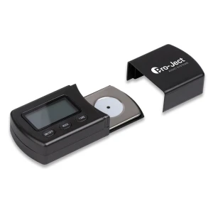 Pocket digital scale with opened lid showing LCD display and three control buttons (On/Off, Mode, Tare), Pro-Ject branding on the cover digitial scale accessory.