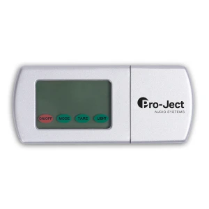 Silver Pro-Ject audio system remote with display and four labeled buttons: ON/OFF, MODE, TARE, LIGHT.