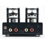 Dual-tube stereo audio preamplifier seen from the back, showing left/right input and output RCA jacks and power jack.