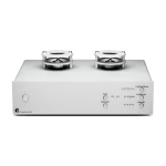 Silver audio amplifier with twin vacuum tubes on top and a minimalist front panel featuring Input, Subsonic, and gain controls labeled on the right side, brand Tube Box S3 B.