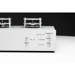 Vintage stereo amplifier front panel with two reel-to-reel machines on top and knobs labeled Input, Subsonic, Loading Ohms, Loading pF, and Gain dB.