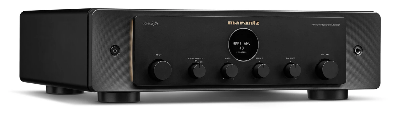 marantz-model-40n-cierna - Enigma High Fidelity Audio Front view of a black Marantz networked amplifier with multiple knobs (input, source direct, bass, treble, balance) and a large volume knob on the right, standing on short feet.