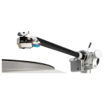 Close-up of a turntable tonearm with a cartridge and colorful wires, hovering above a vinyl platter.
